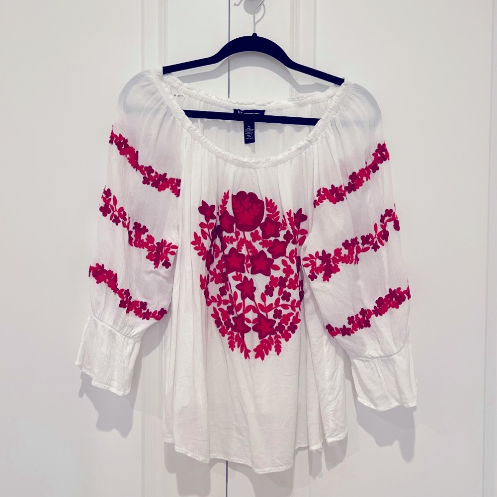 Summer, casual blouse with red detail.